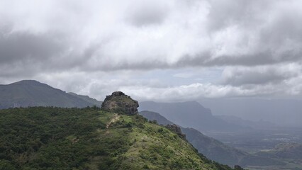peak of a grassy mountain 