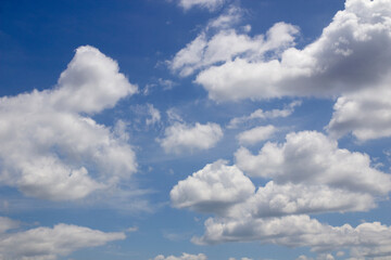Beautiful sky with white clouds and blue background