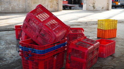 dirty baskets on the warehouse floor