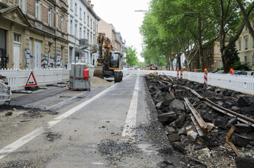 Demolished tram tracks on a city road. Karlsruhe, Rueppurrer street 04 Mai 2025