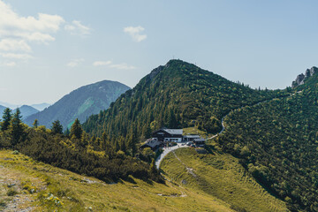 A breathtaking panoramic view from the Herzogstand summit in the Bavarian Alps, overlooking the...