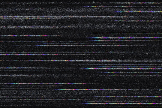 Distorted television screen with pixel noise displays a glitch effect in dark tones, creating an atmosphere of digital error and chaos.