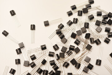 A scattering of plastic transistors. A bipolar transistor for electronics.