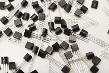 A scattering of plastic transistors. A bipolar transistor for electronics.