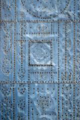 metal entrance door with rivets