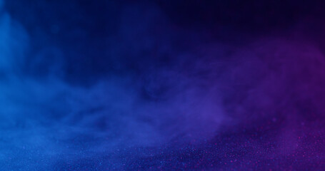 Neon cloud. Ink fog. Defocused blue purple color water glitter fume particles texture floating on...