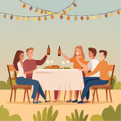 Fototapeta premium Group of friends toasts with beer at lively outdoor dinner party