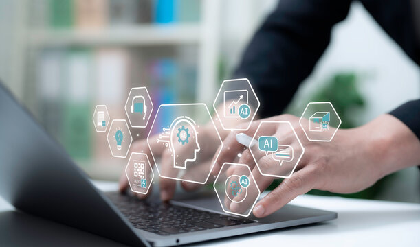 Hands typing on laptop with floating AI interface icons automation chatbots machine learning data analytics cloud smart tools digital transformation business innovation technology