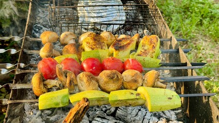 Grilled vegetables are prepared outdoors