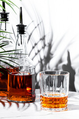 Savor the deep amber tones of Japanese single malt whiskey in a crystal glass, surrounded by...
