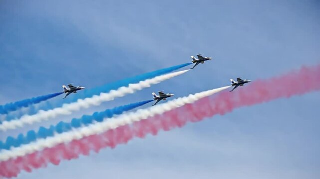 Airplane show making the smoke trail of the French flag.