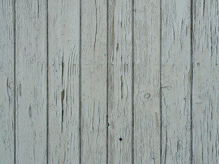 Light grey weathered wood with peeling paint. Rich texture and natural aging. Ideal as background....
