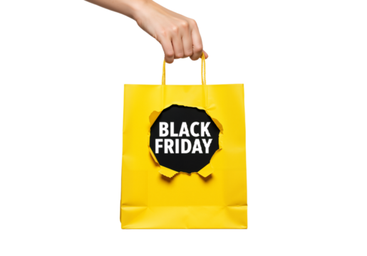 Hand Holding Yellow Shopping Bag with Torn Cutout Revealing Bold Black Friday Text on White Background