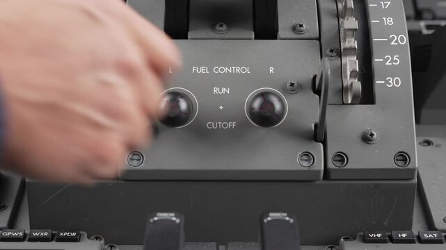 787 Fuel control switches being moved from the "cutoff" position to the "run" position.