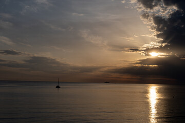 Sunset on seaside vacation destination, Mondello Beach, near Palermo in Sicily with fine, golden...