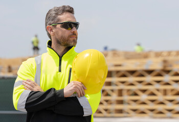 Worker supervisor at heavy machinery. Industry worker at construction. Builder civil engineer at...