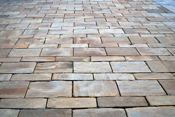 Concrete tiles block pattern in floor or wall style. A view of an old rectangular marble sidewalk in and gray, texture backgrounds