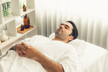 Caucasian couple customer enjoying relaxing anti-stress spa massage and pampering with beauty skin...