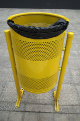 yellow trash can
