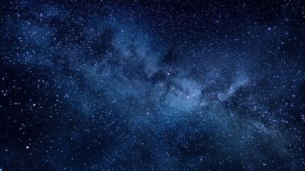 Obraz premium Radiant Celestial Bodies: A Minimalist View of Twinkling Stars Against a Deep Blue Night Sky