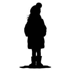 Young girl standing in silhouette wearing a winter coat and hat  