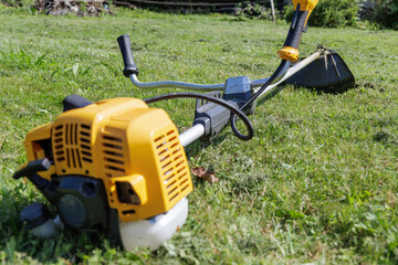 Gas-Powered String Trimmer on a Lawn