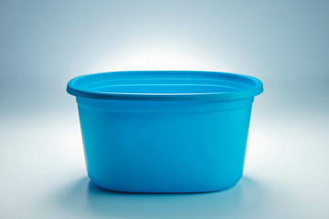 Bright Blue Plastic Container on Gradient Background