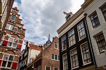 Fototapeta premium Amsterdam and the canals that run through it during a summer day