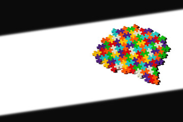 Brain shaped colorful jigsaw puzzle on abstract background