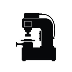 Black silhouette of industrial machine with screen