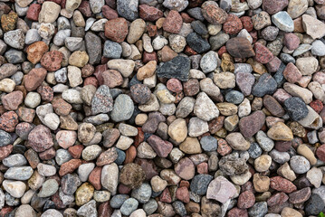 Top view bright colorful pebbles gravel.