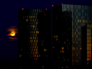 full moon in the city at night