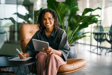 Successful happy african american business woman, startup coworker or software programmer engineer