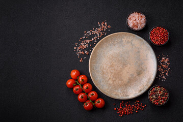 Empty ceramic plate on a monochrome brown background. Empty plate