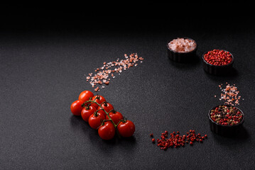 Ingredients for cooking cherry tomatoes, salt, spices and herbs