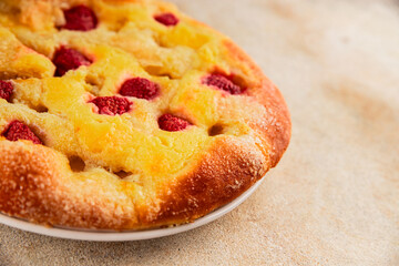 Sweet pie raspberry  frangipane dessert baking fresh delicious gourmet food background on the table...