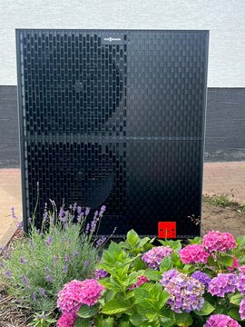 Germany, Paderborn, July 13. 2025, sign or lettering of an air source heat pump from Viessmann, old house energy-efficiently renovated