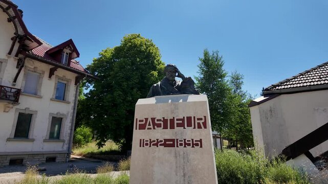 Monument of Louis Pasteur in Jura, France. One Outdoor Historical Statue. Real time.