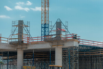 A bustling construction site near Ljubljana Train Station rises under a clear July 2025 sky....