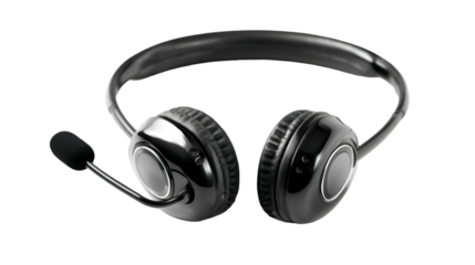 A close up shot of a black headset with a microphone on a black background in a studio setting