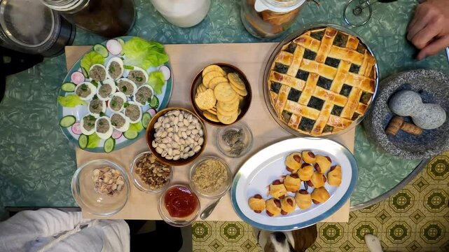 Kitchen 1308 Deviled Eggs Pie Piginblankets Pistachios Ketchup Mustard Crackers Cuttingboard Meal Preperation Healthy Lifestyle Eating Food