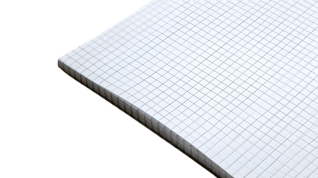 A stack of white graph paper sheets with a grid pattern on a dark background in a close up shot