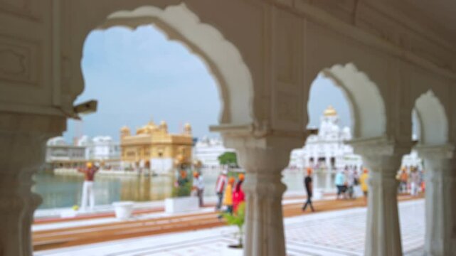 Bokeh view of Golden temple in Amritsar, India. Blurred background footage.