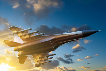 Military jet fighter armed with missiles flying through sunset sky during combat mission or...