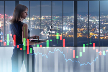 Business woman with laptop. Female financier standing in office. Lady investor with computer in...