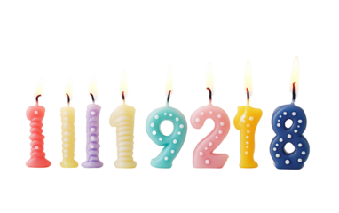 Close-up of colorful birthday candles shaped in playful forms capturing festive energy and joyful spirit isolated on transparent background PNG