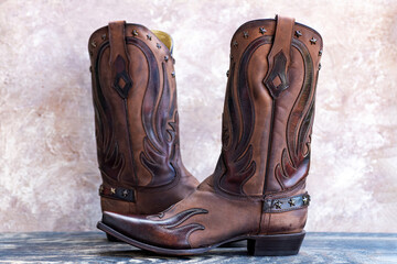 Rich Brown Leather Cowboy Boot. Elegant stitching and embossed western pattern details