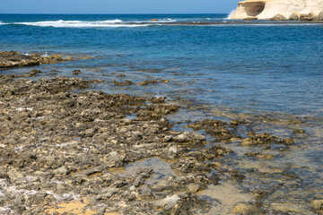 Rock meet the Blue Ocean, Water Surface and Blue Sky