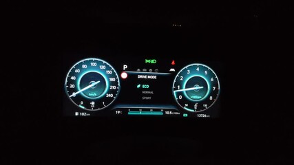 Car dashboard display.backlight on the machine control device - Powered by Adobe