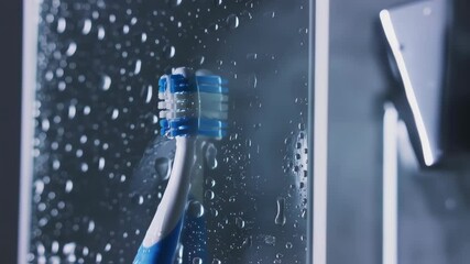 Closeup of Electric Toothbrush Brushing Surface with Water Droplets in Bathroom Setting - Powered by Adobe